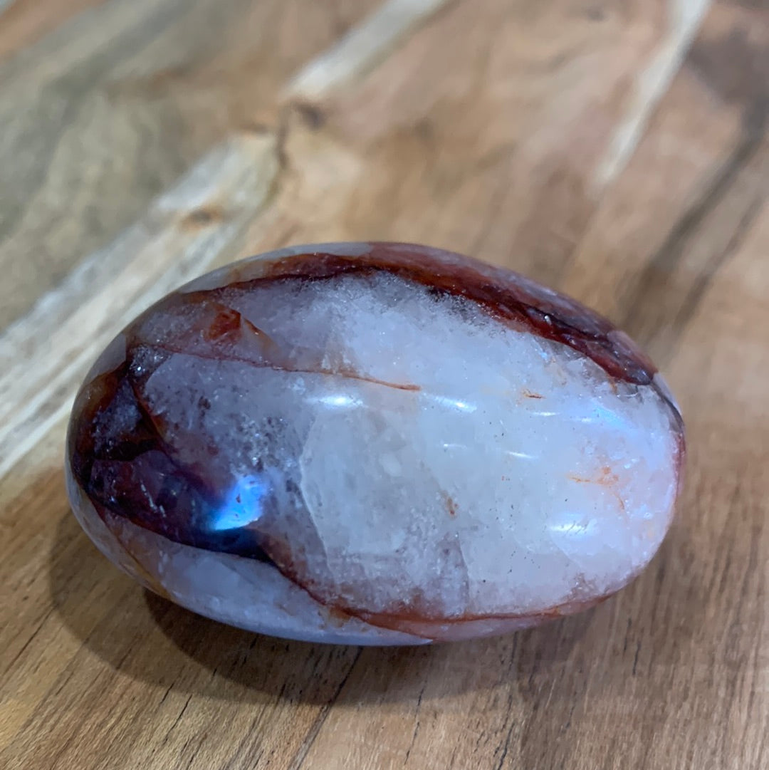 FIRE QUARTZ EGG SHAPED PALMSTONE