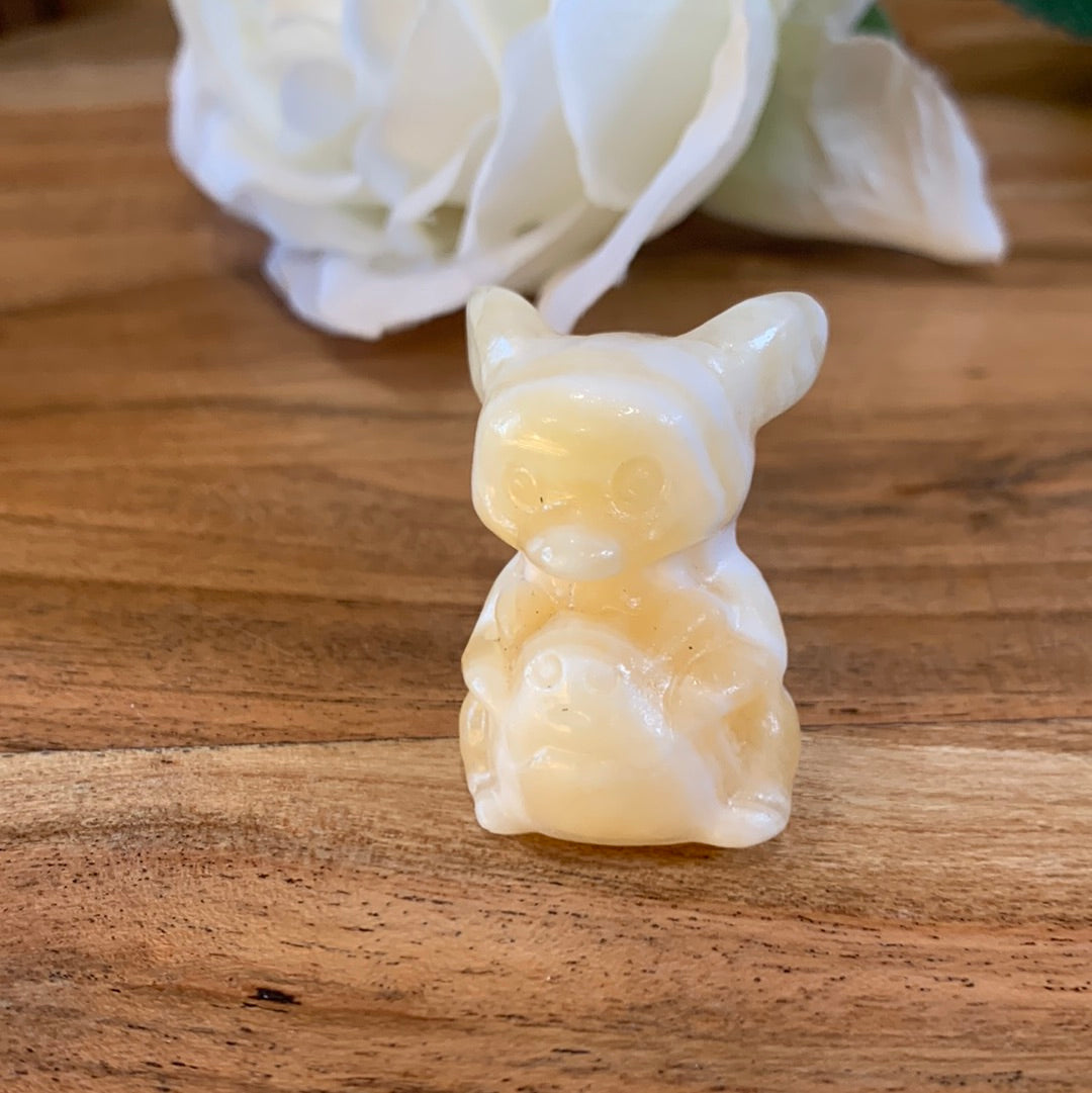 WINNIE THE POOH IN HONEY CALCITE, BLACK OBSIDIAN, OPALITE & RUBY ZIOSITE