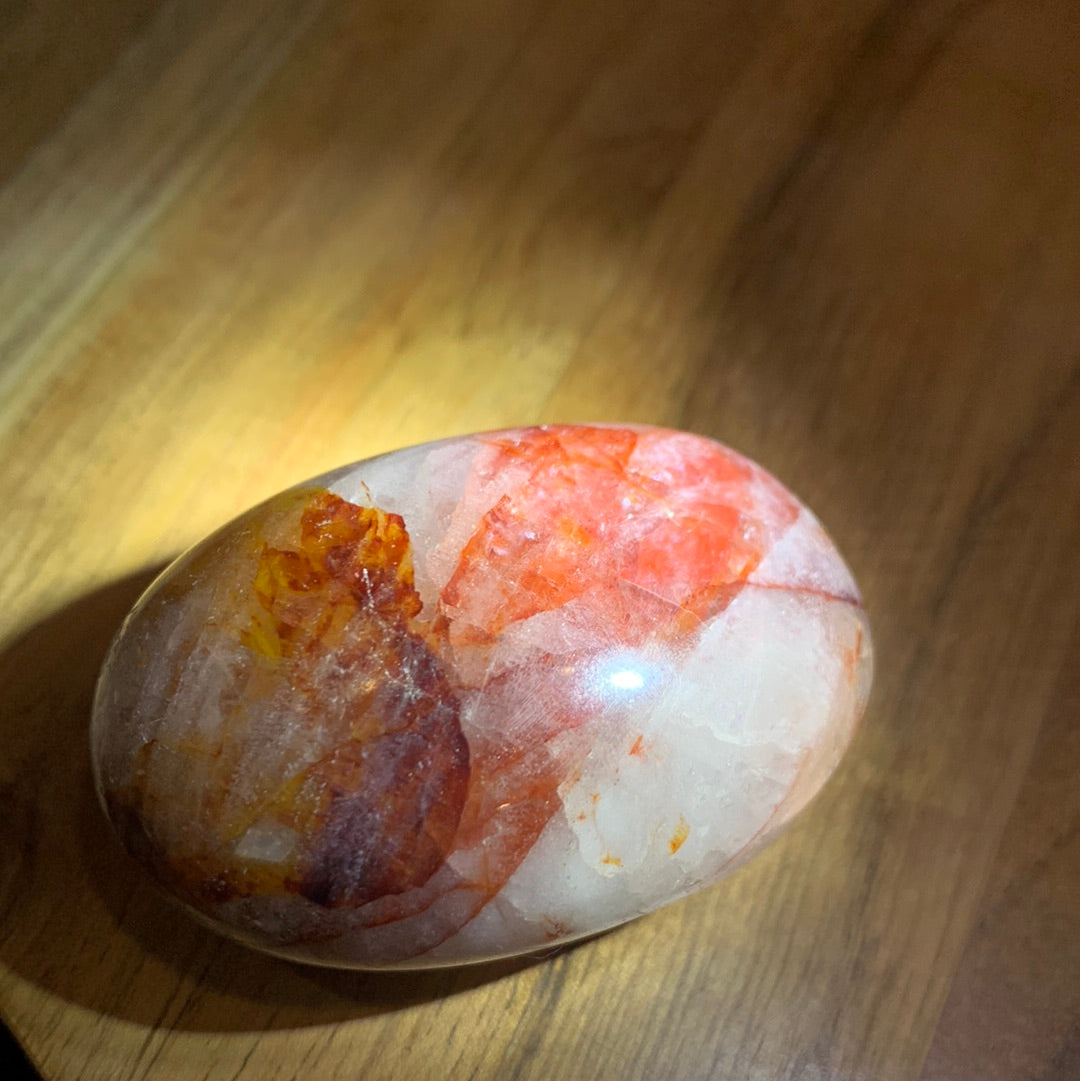 FIRE QUARTZ EGG SHAPED PALMSTONE