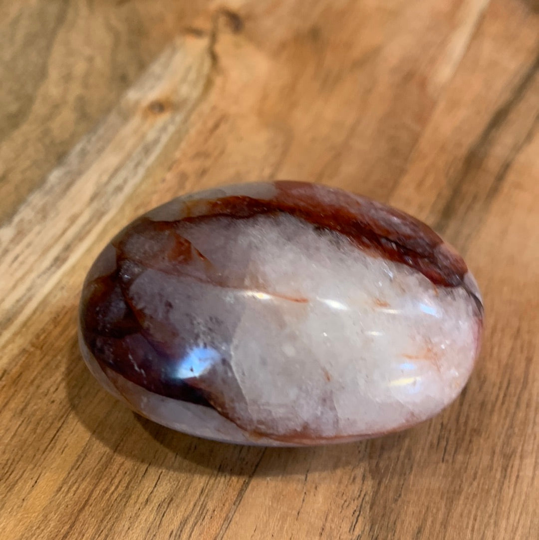 FIRE QUARTZ EGG SHAPED PALMSTONE