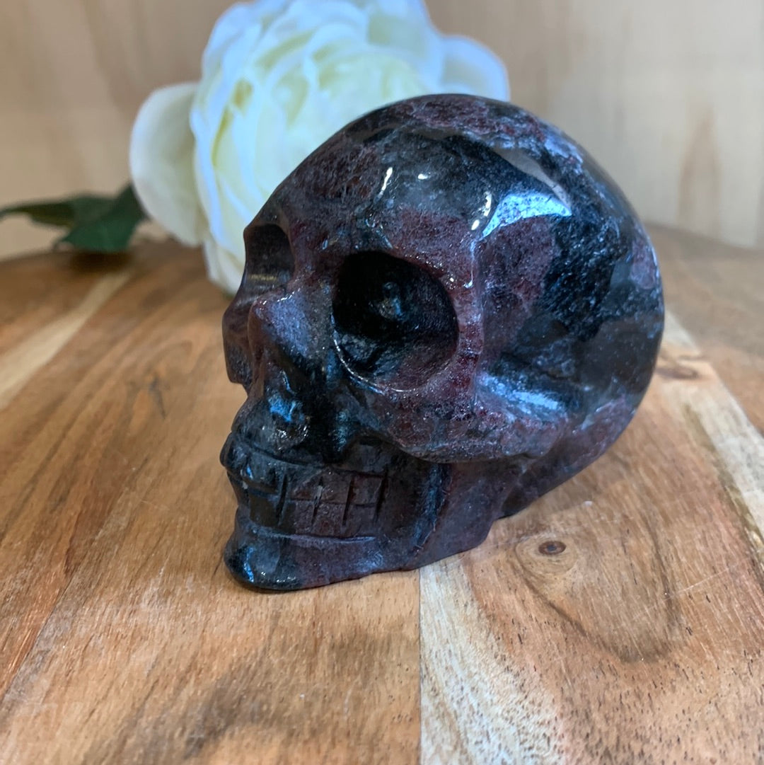 ASTROPHYLITE AND GARNET SKULL