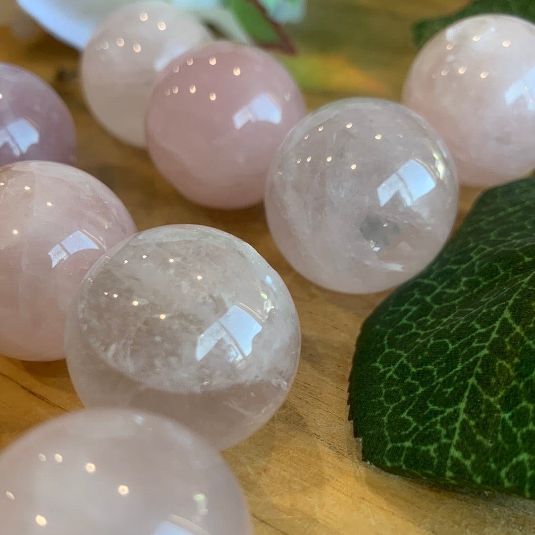 ROSE QUARTZ SPHERES SMALL (EACH ONE HAS HOLE HALFWAY DRILLED IN