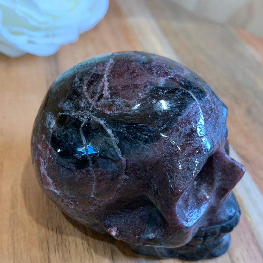 ASTROPHYLITE AND GARNET SKULL
