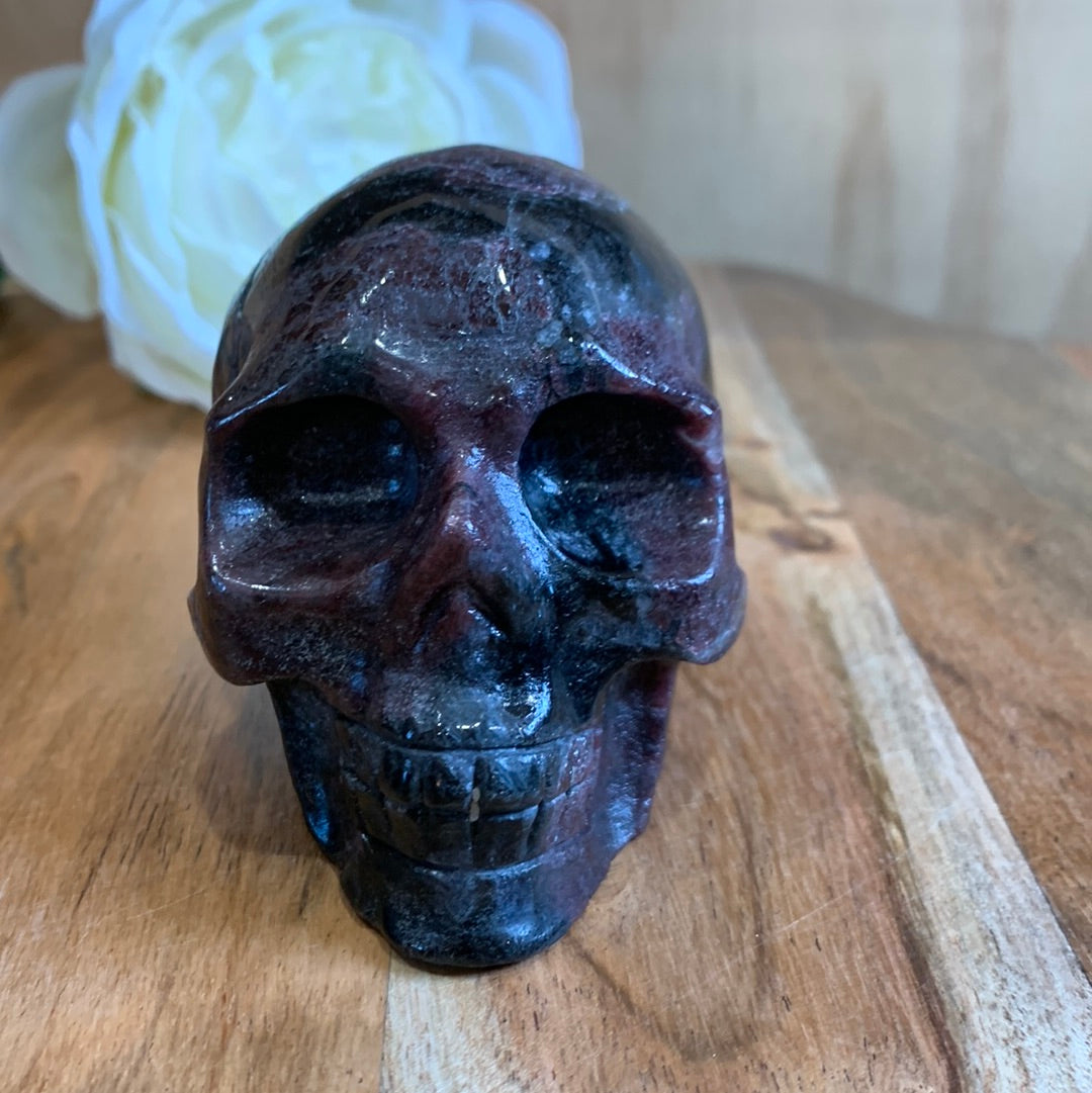 ASTROPHYLITE AND GARNET SKULL