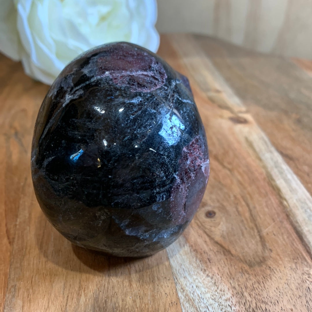 ASTROPHYLITE AND GARNET SKULL