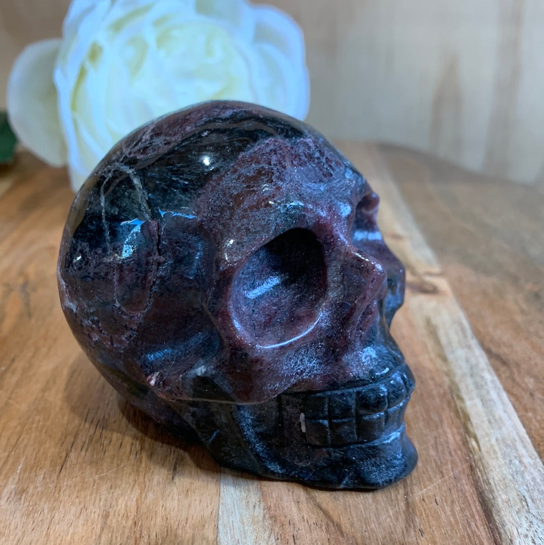 ASTROPHYLITE AND GARNET SKULL