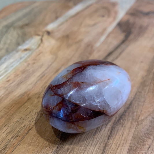 FIRE QUARTZ EGG SHAPED PALMSTONE