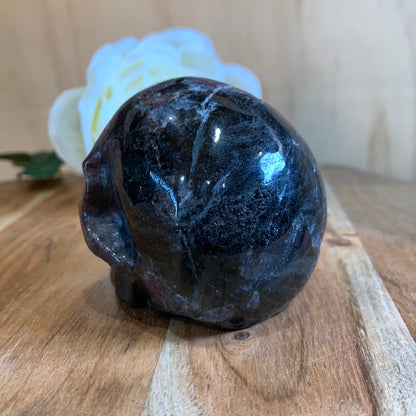 ASTROPHYLITE AND GARNET SKULL