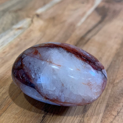 FIRE QUARTZ EGG SHAPED PALMSTONE