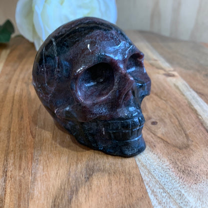ASTROPHYLITE AND GARNET SKULL