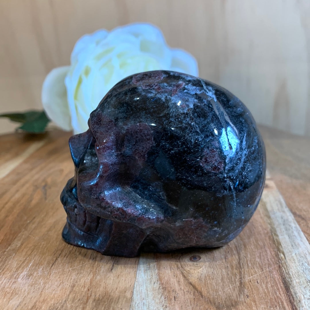 ASTROPHYLITE AND GARNET SKULL