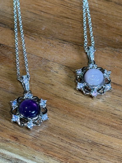 CRYSTAL PENDANTS/NECKLACES